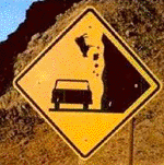 road caution sign - falling cow